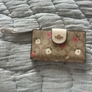 Coach Tan Wristlet with Pink and White Floral Design